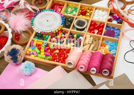thread and sewing accessories top view, seamstress workplace, many object for needlework, embroidery, handmade and handicraft Stock Photo