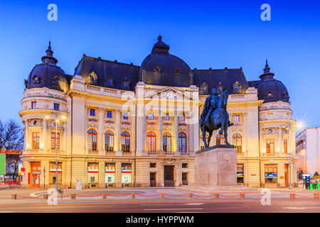 Bucharest, Romania. The Central University Library and statue of King Carol I of Romania Stock Photo