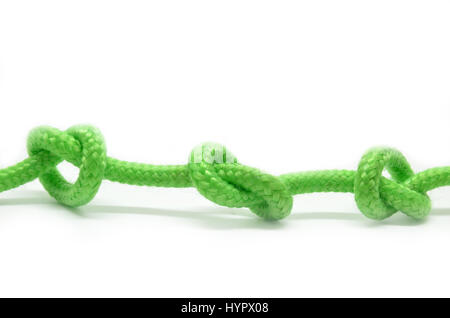 Three tied knots on green rope, isolated Stock Photo