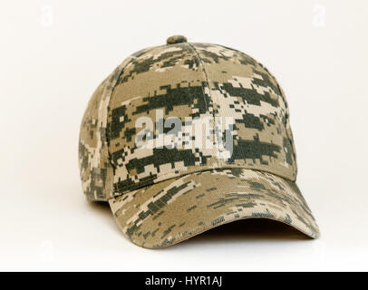 Camouflage patterned baseball cap isolated on white background. Stock Photo