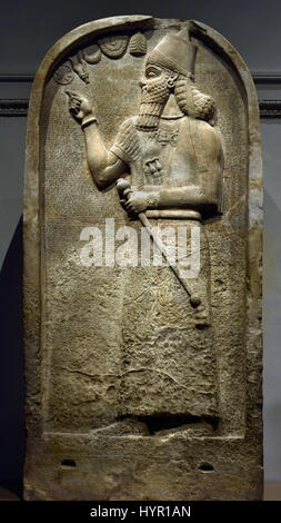 Gypsum stela of the Assyrian King  Ashurnasirpal II 883–859 B.C Royal Palace of Nimrud . Mesopotamia Iraq Kalhu Assyria. Stock Photo