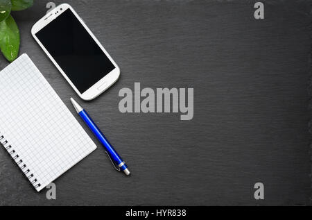 Modern clean desktop with male hands on stone office table. Stock Photo