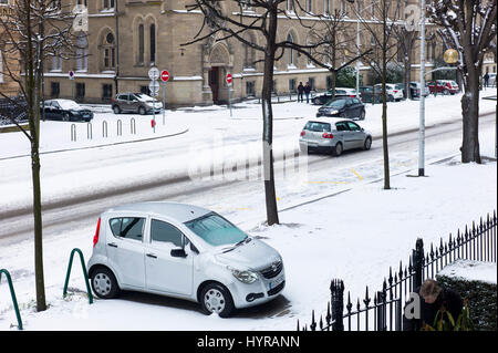 Car parked on pavement, cars traffic, snow, winter, Strasbourg, Alsace, France, Europe, Stock Photo