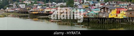 Palafitos. Traditional wooden houses built on stilts along the waters edge in Castro, capital of the Island of Chiloé. Stock Photo