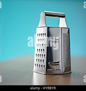 Grater on table Stock Photo