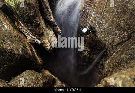 Speleologist Interior Of Mayei Cave Waterfall Entrance Shaft In Ecuadorian Amazonia Stock Photo