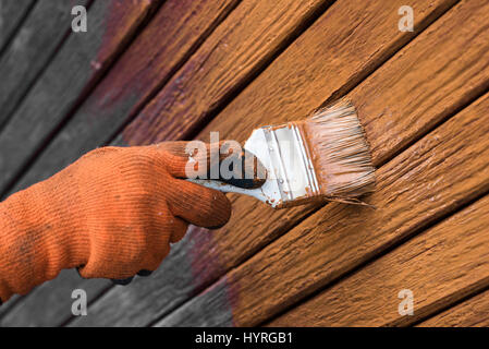 Painting wooden door, updates appearance. Preparing for the holidays. Ukraine Stock Photo