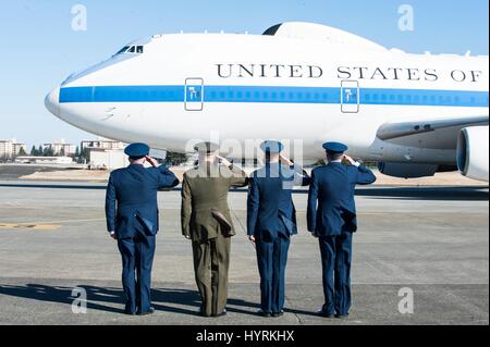 U.S. Forces Japan Commander Jerry Martinez (L-R), Deputy Commander Charles Chiarotti, Chief Master Terrance Greene, and Commander Kenneth Moss salute U.S. Defense Secretary James Mattis as he arrives at the Yokota Air Base February 3, 2017 in Tokyo, Japan. Stock Photo