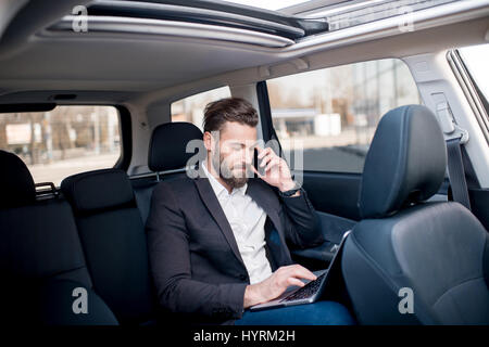 Businessman in the car Stock Photo