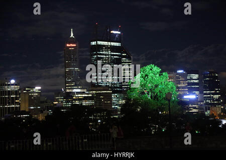 The full moon rises over the buildings in Perth, Australia. Perh is the state capital  of Western Australia. Stock Photo