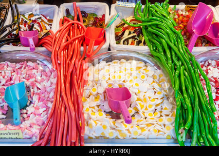 Sweets and liquorice strings at a pick and mix sweet stall, England, UK Stock Photo
