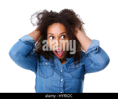Close up portrait of a young woman with scared expression on face Stock Photo