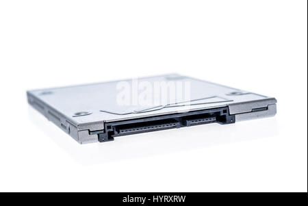 Solid state drive SSD isolated on white background. SATA - data and electricity connectors view, shallow depth of field. Stock Photo