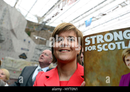 SNP leader and Scottish First Minister Nicola Sturgeon holds up a copy of the party's general election manifesto, as she launched it in Edinburgh Stock Photo