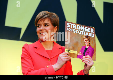 SNP leader and Scottish First Minister Nicola Sturgeon holds up a copy of the party's general election manifesto, as she launched it in Edinburgh Stock Photo