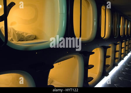 Tokyo, Japan - Interior of capsule hotel. Stock Photo