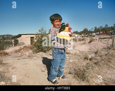 Unreleased image. For editorial usage only. Very young Tarahumara Indian boy living on the rim of Copper Canyon, near the Mexican town of Creel, in the Sierra Madre, Mexico Stock Photo