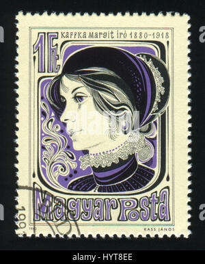 HUNGARY - CIRCA 1980: A stamp printed in Hungary shows portrait Margit Kaffka writer, circa 1980. Stock Photo