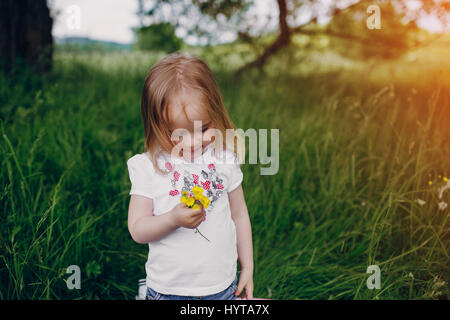 child near tree Stock Photo