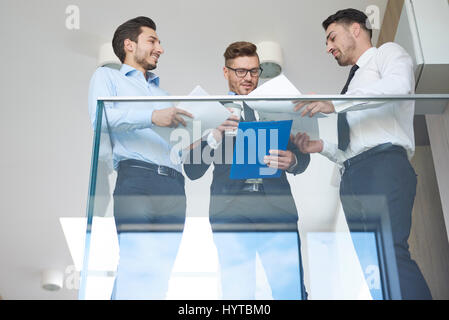Businessmen discussing over new project of the company Stock Photo