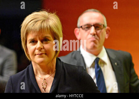 Nicola Sturgeon after being officially announced as the new leader of the Scottish National Party at the party's Annual Conference in Perth, with newly-elected depute leader Stewart Hosie MP in the background Stock Photo