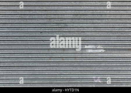Old metallic roller shutter texture used for security Stock Photo