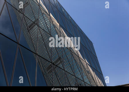 Images of IFC, Hong Kong's tallest building on the island. Reflections of the building captured on a rare clear blue sky day in Hong Kong. Stock Photo