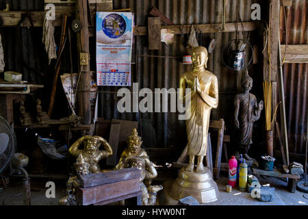 Buddha statues in a workshop at the Buranathai Buddha Image Foundry, Phitsanulok, Thailand. Stock Photo