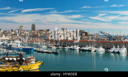 Genoa, Liguria, Italy - February 26, 2017: Serene panoramic view of old port in Genoa the major Italian seaport on the Mediterranean Sea with cityscap Stock Photo