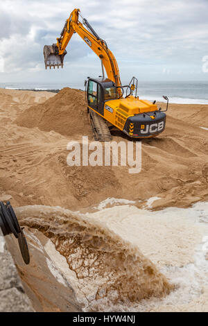 Hydraulic transfer system of sand, at Capbreton (Landes - France). With aid of a bypass, 100,000 cubic metres of sand excess is transferred each year  Stock Photo