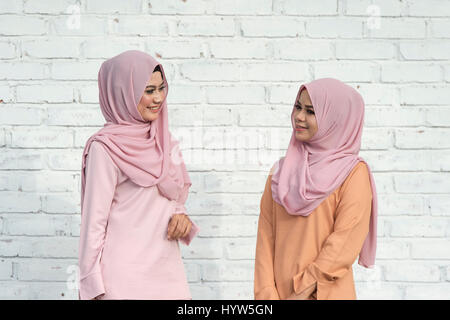 Happiness concept of young, friendly and smiling confident Muslims female. Photogenic asian muslim. Beautiful. Stock Photo