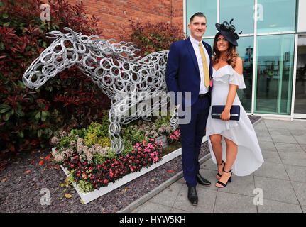 Racegoers arriving on Ladies Day of the Randox Health Grand National Festival at Aintree Racecourse. Stock Photo