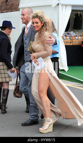 Racegoers on Ladies Day of the Randox Health Grand National Festival at Aintree Racecourse. Stock Photo