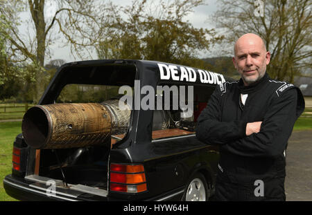Matt McKeown with his converted 1992 Ford Cardinal hearse 'Dead Quick' at the Prescott Hill Climb in Gloucestershire. Stock Photo