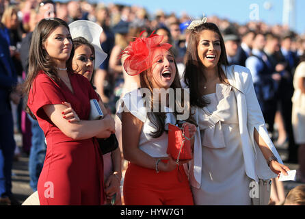 Racegoers on Ladies Day of the Randox Health Grand National Festival at Aintree Racecourse. Stock Photo