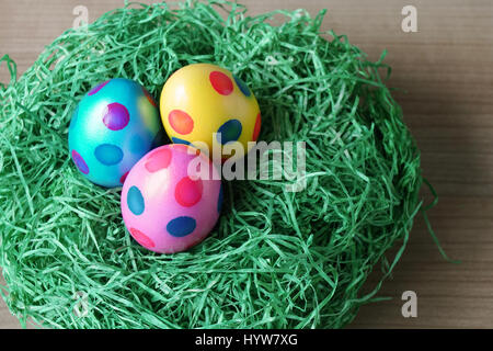 close-up easter eggs and grass decoration Stock Photo