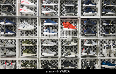 Adidas trainers/training shoes store display in Sports Direct store. UK ...