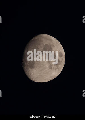 London, UK. 7th April 2017. 88.4% waxing gibbous moon in clear evening sky above London. Credit: Malcolm Park/Alamy Live News. Stock Photo