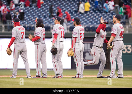 Philadelphia, Pennsylvania, USA. 6th Apr, 2019. Minnesota Twins catcher  Willians Astudillo (64) holds up the ball after tagging Philadelphia  Phillies right fielder Bryce Harper (3) out at home with relief pitcher  Adalberto