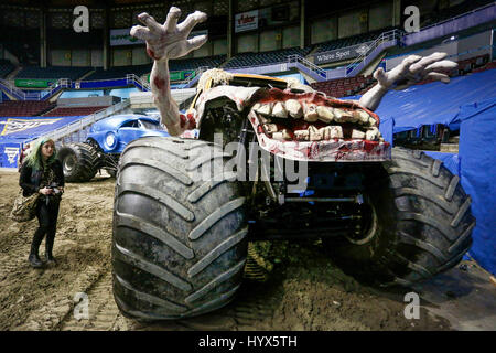 Vancouver, Canada. 7th Apr, 2017. A resident visits a monster truck on the race track during the Monster Jam show at Pacific Coliseum in Vancouver, Canada, April 7, 2017. Credit: Liang Sen/Xinhua/Alamy Live News Stock Photo