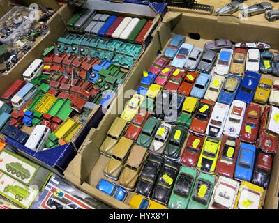 A selection of rare and collectable used toy cars, buses and lorries for sale at a Vintage Toy Fair at Bath & West Showground, Somerset, England Stock Photo