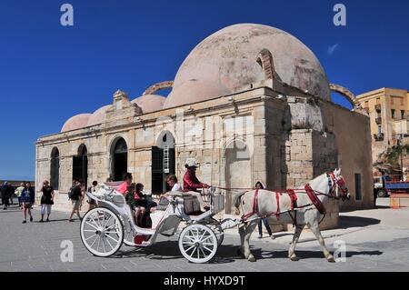 'Gyali Tzamisi' (also known as 'Kucuk Hasan Pasha mosque') at the Venetian harbor of Chania, Crete, Greece Stock Photo