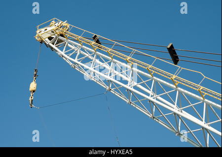 dockyard cargo crane detail against a blue sky Stock Photo