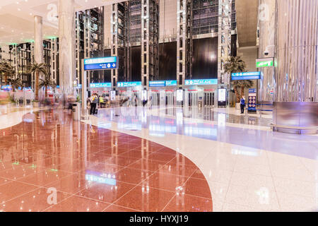 DUBAI, UAE - MARCH 7, 2017: Dubai International Airport¸. Dubai International Airport is the primary airport serving Dubai. It is world largest buildi Stock Photo