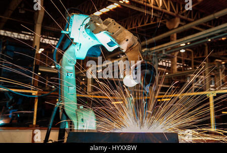Robot welding is welding assembly automotive part in factory Stock ...