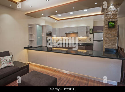 Interior design decor showing modern kitchen and appliances in luxury apartment showroom Stock Photo