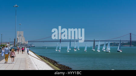 Sailing regatta in the Tajo river with Padrao dos Descobrimentos in background, Lisbon, Portugal, July-09-2016 Stock Photo