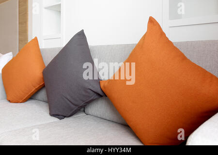 colorful pillows on sofa in living room Stock Photo