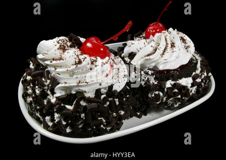 Forest cakes isolated on a black background Stock Photo