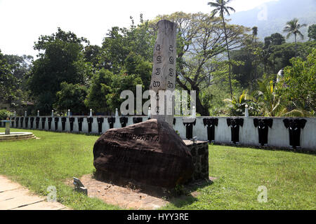 Aluviharaya Rock Cave Temple Entrance Sri Lanka Matale District Kandy-Dambulla Highway Row Of Carved Elephants In Wall And Sign Stock Photo